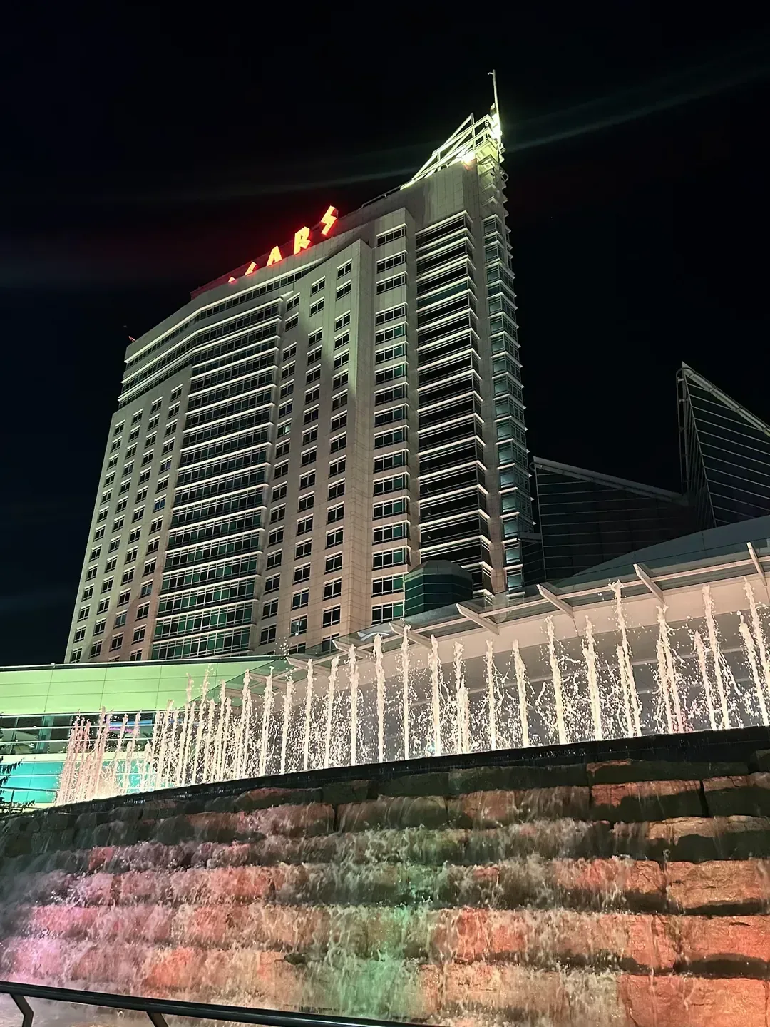 Hotel complex along a riverfront promenade